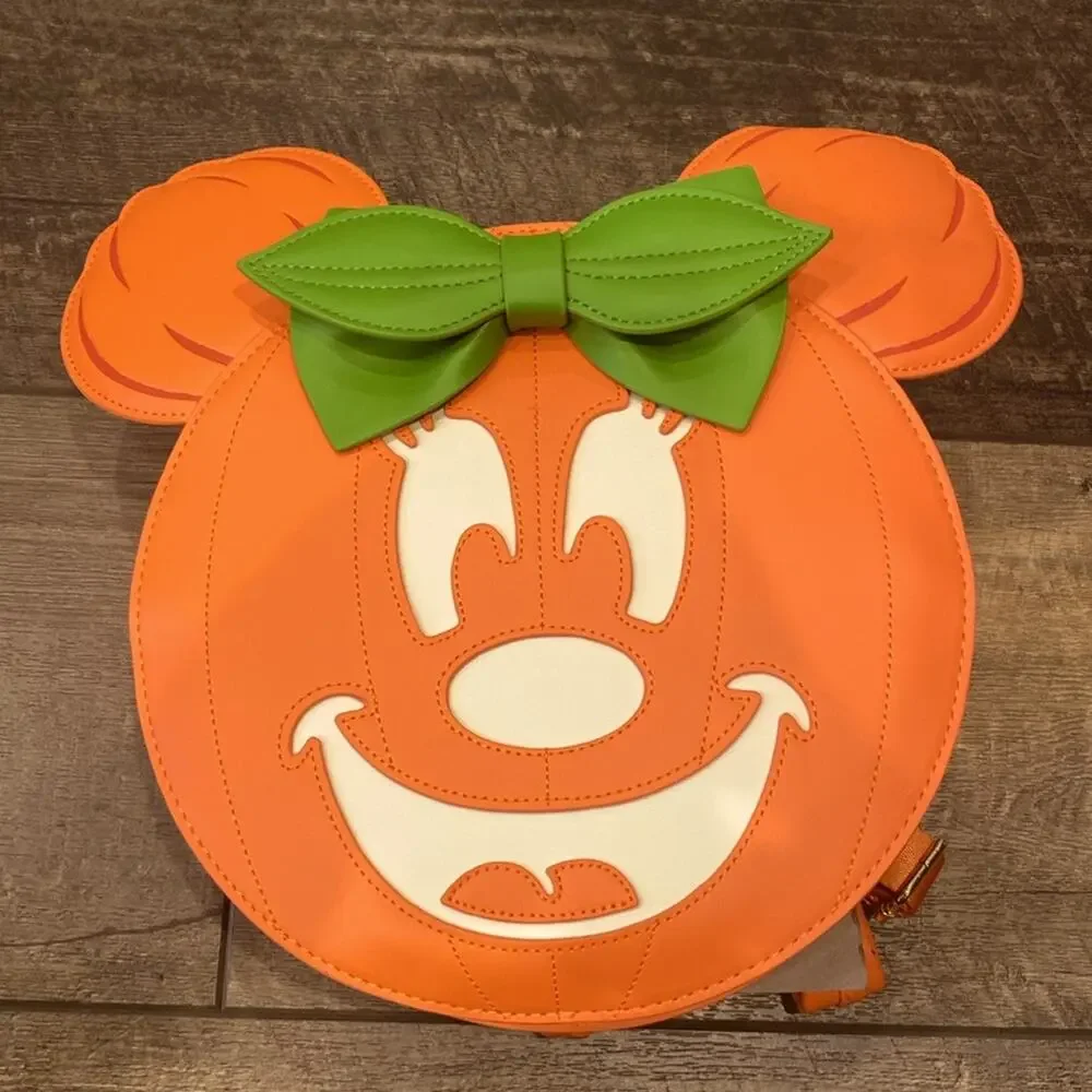 NWT Loungefly Disney GLOW FACE Minnie Pumpkin Backpack